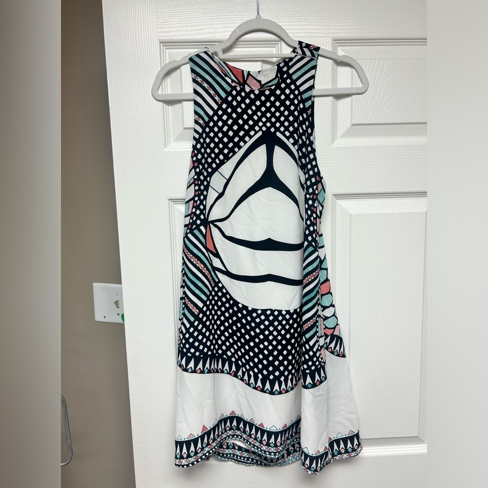 Colourful dress with open back.